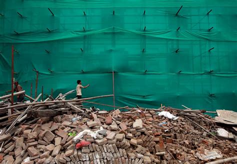 A 5.2 magnitude earthquake in Nepal damages dozens of homes and causes a landslide
